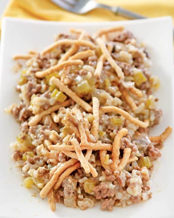 American chop suey with ground beef and rice on a platter.