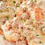 closeup of homemade Bob Evans sausage gravy and biscuits.