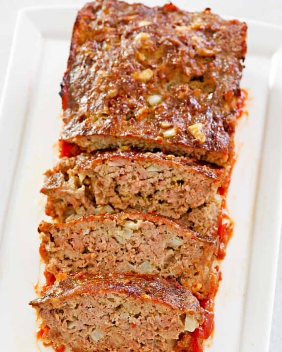 brown sugar meatloaf on a rectangular platter.