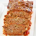 brown sugar meatloaf on a white platter.