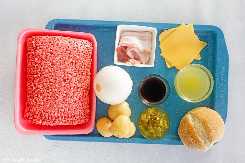 cheeseburger soup ingredients on a tray.