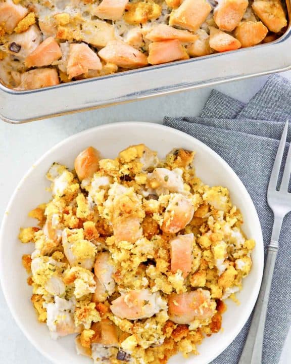 overhead view of chicken and dressing casserole in a baking dish and on a plate.