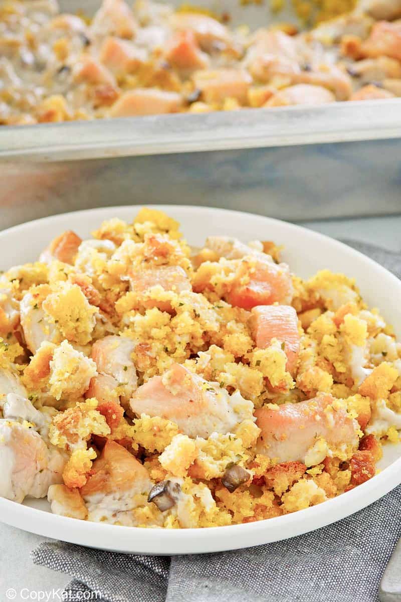 chicken and dressing casserole serving on a plate.