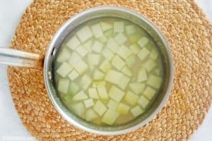 potatoes and water in a pan.