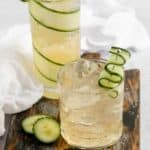 two fleur de lis cucumber gin cocktail drinks.