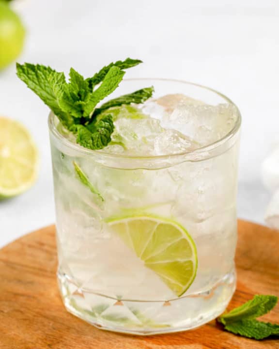 classic mojito cocktail on a wood board.