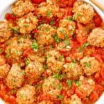 overhead view of porcupine meatballs in a bowl.