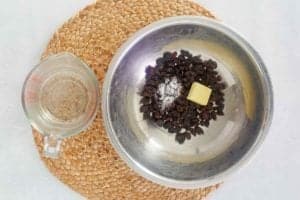 soaking raisins with butter for Boston brown bread.