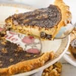 a slice of chess pie on a pie server.