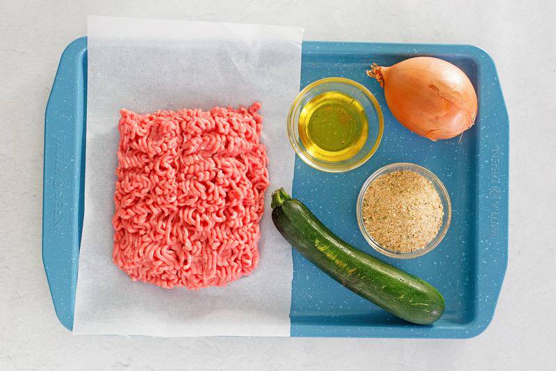 chicken croquettes ingredients on a tray.