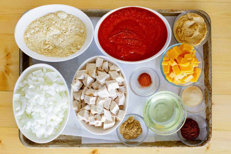 Chili's chicken enchilada soup ingredients on a tray.