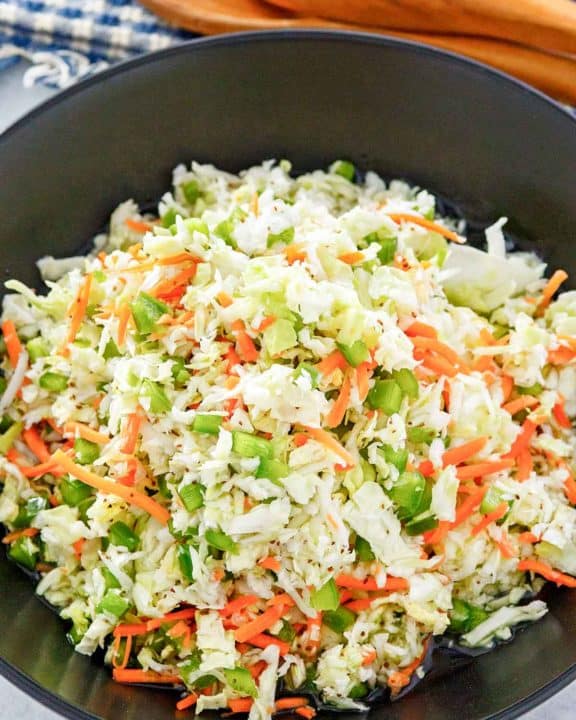 freezer slaw in a black bowl.