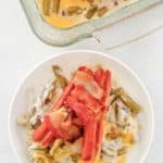 overhead view of hot dog casserole in a dish and on a plate.