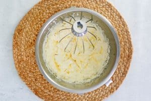 whipped cream with stiff peaks in a bowl.