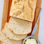 overhead view of homemade beer bread on a cutting board.