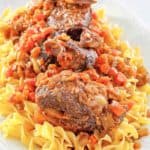 braised short ribs and noodles on a platter.