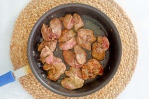 cooked chicken livers in a skillet.