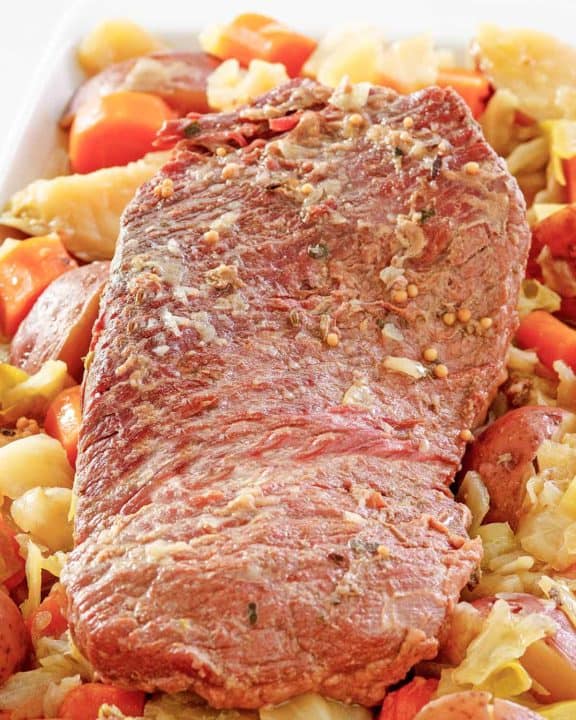 instant pot corned beef with cabbage, potatoes, and carrots.
