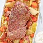 overhead view of instant pot corned beef and cabbage on a tray.