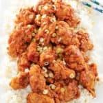 copycat Panda Express orange chicken and rice on a platter.