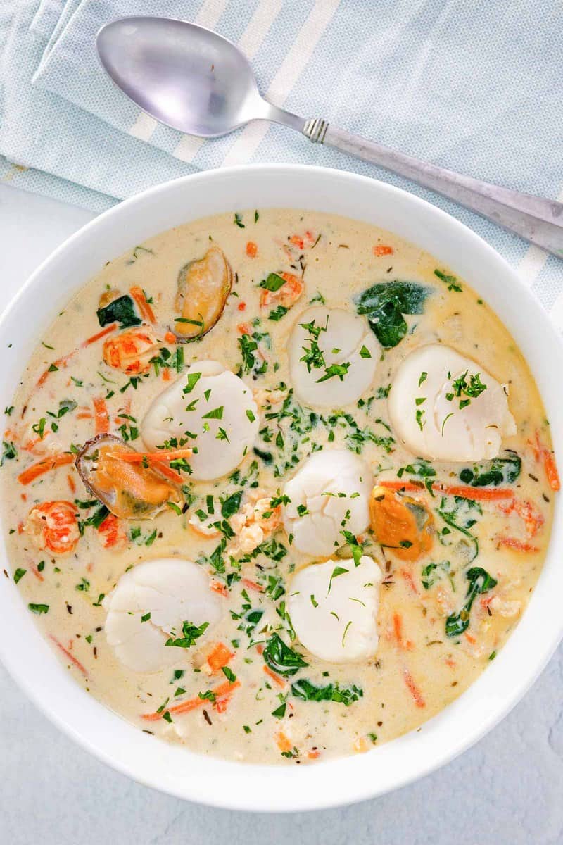 overhead view of a bowl of seafood bisque.