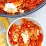 overhead view of lasagna in a bowl and a skillet.