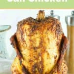 smoked beer can chicken on a rack.