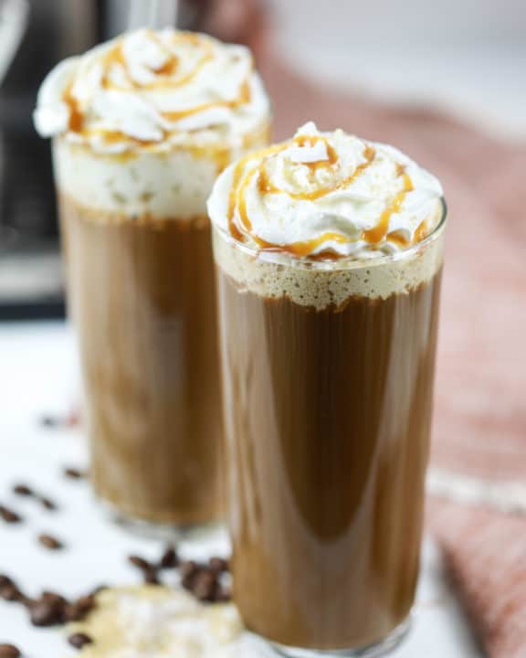 two homemade Starbucks salted caramel latte drinks.