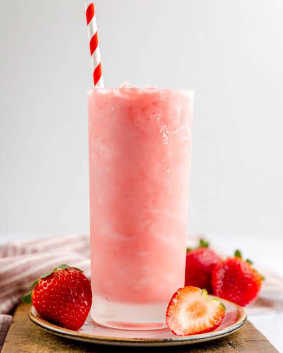 homemade Wendy's Strawberry Frosty and fresh strawberries.