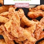 overhead view of beer battered chicken on a platter.