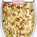 a platter of boiled cabbage and bacon