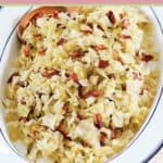 a platter of boiled cabbage with bacon.