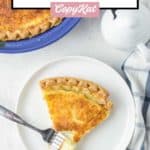 buttermilk pie slice and a fork on a plate.