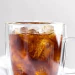 a cup of cold brew coffee with ice.