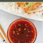 a bowl of homemade katsu sauce and chopsticks next to it.