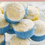 lemon poppy seed muffins on a glass platter.