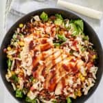 overhead view of copycat Panera BBQ chicken salad and a fork on a napkin.