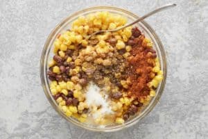Panera black bean corn salsa ingredients in a bowl.