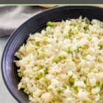 sauerkraut salad in a black bowl.