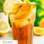 a glass of sweet iced tea with lemon.