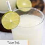 copycat Taco Bell pina colada frutista freeze garnished with lime.