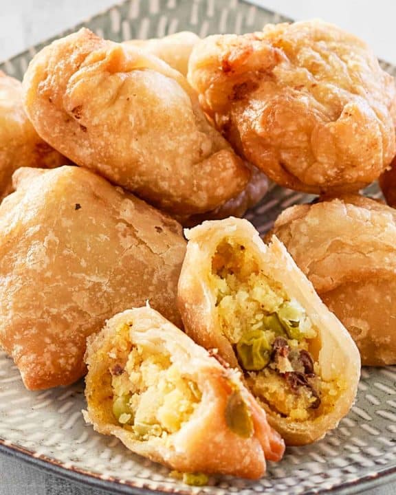 vegetable samosas on a platter.