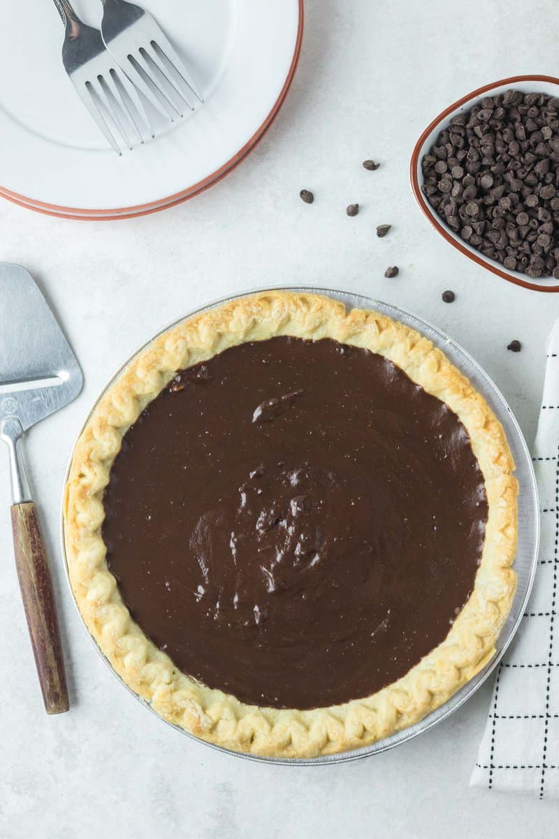 overhead view of a homemade chocolate pie with pastry crust.