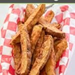 homemade potato wedges on parchment paper.