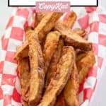 homemade deep fried potato wedges in a basket.
