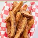 basket of homemade deep fried potato wedges.