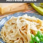 copycat olive garden alfredo sauce and fettuccine on a plate.