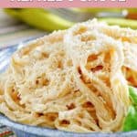 a bowl of copycat olive garden alfredo sauce and fettuccine.