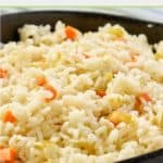 rice pilaf in a black bowl.
