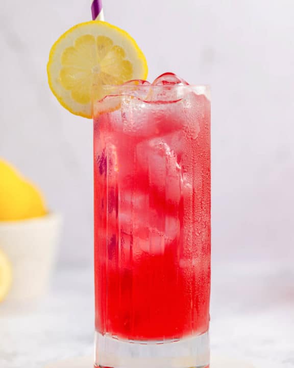 copycat Starbucks passion tea lemonade drink on a coaster.